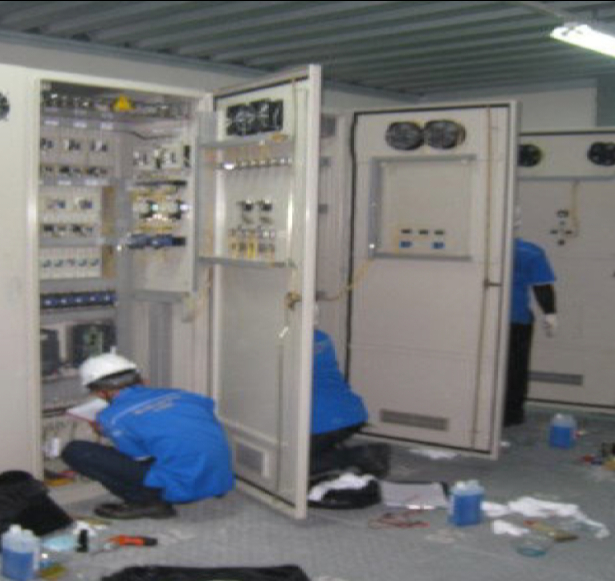 a group of people working in a room